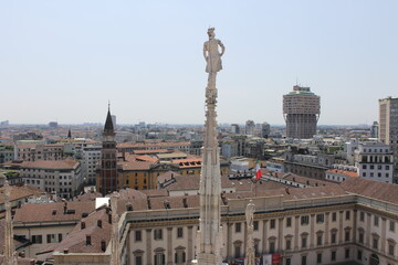 Fototapeta na wymiar A panoramic view of the city of Milan, Italy, from the top of the gothic cathedral