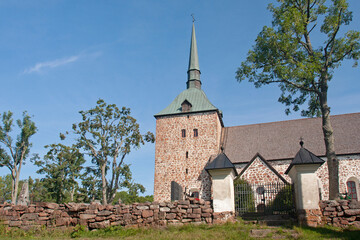 Fototapeta na wymiar The medieval stone churcd of Sund at Åland islands, Finland, Europe