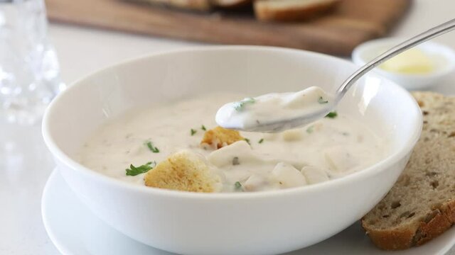 Eating a Bowl of Clam Chowder