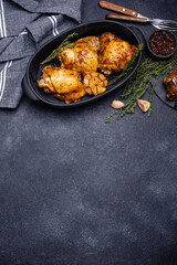 Grilled chicken thighs with garlic