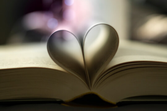 Heart-shaped Folded Book Art with light bubbles - valentine's day