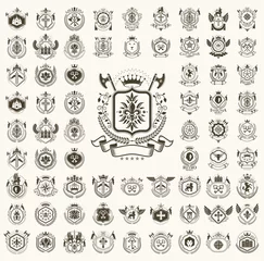 Fotobehang Classic style emblems big set, ancient heraldic symbols awards and labels collection, classical heraldry design elements, family or business emblems. © Sylverarts