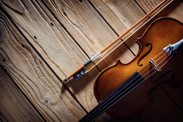 Violin on wood background with copy space for music concept