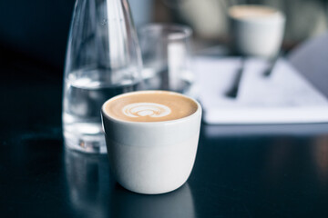 cup of coffee on the office table