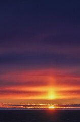 sunset over the sea portrait