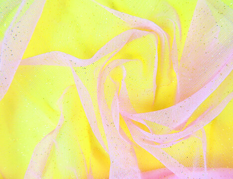 Elegant  pink mesh fabric with gold sequins on yellow .  background design with copy space - Powered by Adobe