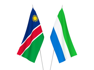 National fabric flags of Sierra Leone and Republic of Namibia isolated on white background. 3d rendering illustration.