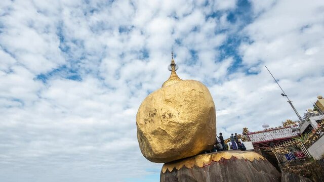 Timelapse view of worshippers at Kyaiktiyo Pagoda aka Golden Rock, an important Buddhist pilgrimage site in Mon State, Myanmar (Burma). 