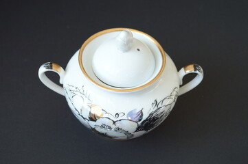 teapot for brewing tea on a black background