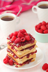 Sandwiches with peanut butter and raspberry jam