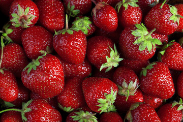 photo texture of many fresh big ripe strawberries background