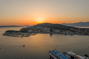 Aerial drone shot of port view with sun set over Marjan Hill in Croatia in summer