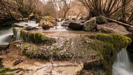 water flowing into the river