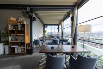 Interior of an empty restaurant with a view