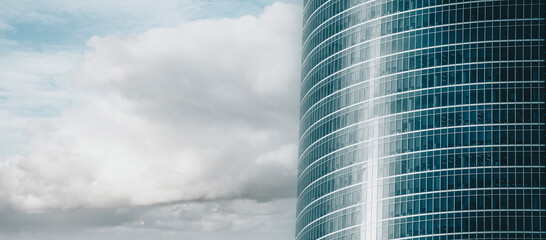 Architecture background of fragment of modern office building with blue glazing of facade. High...