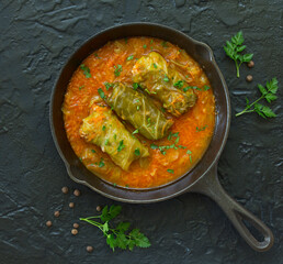 Ukrainian traditional dish with cabbage and stuffed cabbage. Selective focus.