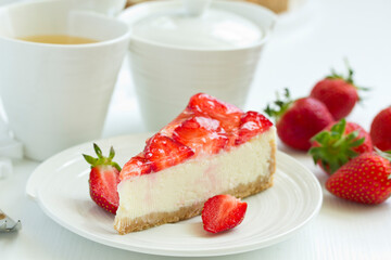 Classic cheesecake with fresh strawberries. Selective focus.