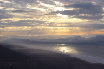 Obraz premium sunset over the clouds