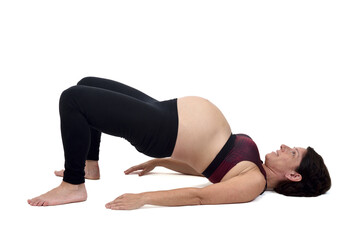 Fototapeta na wymiar pregnant woman doing exercises on white background