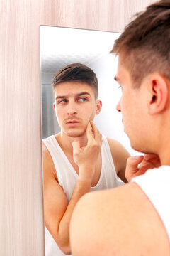 Young Man near the Mirror