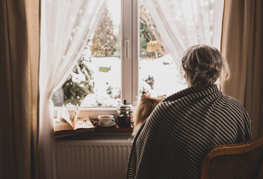 Old Retired Woman (senior) By The Home Window - Retirement Concept