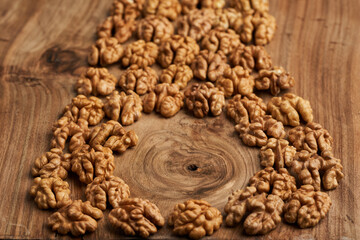 Walnut kernels on wooden board
