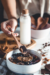 making a granola smoothie