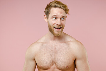 Excited bearded naked young man 20s years old perfect skin keeping mouth open looking aside...