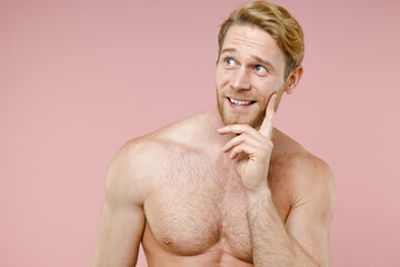 Funny pensive bearded naked young man 20s years old perfect skin put hand prop up on chin isolated...