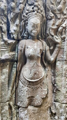 Sculptures of Apsara dancers on the temple wall in Angkor Wat temple. Khmer temple. Unesco World Heritage Site. Siem Reap Province. Cambodia. South-East Asia