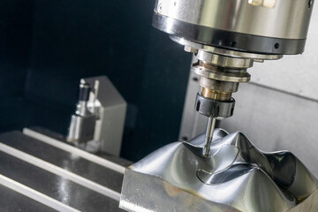 The  CNC  milling machine cutting  the mold parts by solid ball  end-mill tool. The hi-precision...