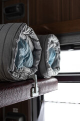 Mattress and pillow folded in the train carriage