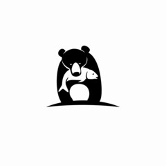 bear carrying a big fish on mouth, represents a winning time, good food, 
joyness, simple but memorable logo for restaurant and fishing business.
