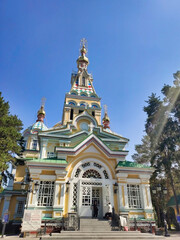 Fototapeta na wymiar Almaty: Ascension Cathedral (Zenkov's Cathedral). Orthodox Christian church in the park. Kazakhstan