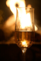 champagne glass with fire background