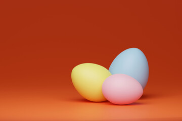 Colorful eggs on an orange background, 3d render