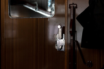 Door and doorknob in a train compartment