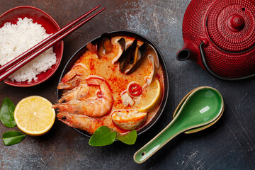 Traditional Thai soup Tom Yum and rice bowl