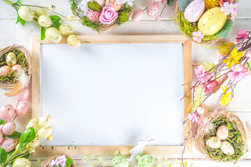 Happy easter background with Nests decoration, colorful eggs and Spring Flowers. Caster card on sunny spring background