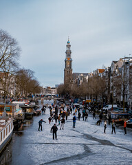 Amsterdam Netherlands February 2021,Ice skating on the canals in Amsterdam the Netherlands in...
