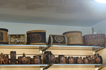 Birch bark bins and clay beer mugs with Russian text: Kostroma