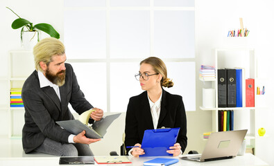 Successful project. business colleagues in modern office. mentor coach speaking to assistant. woman...