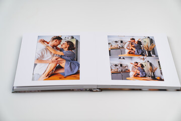 pages of photobook from photo shoots of a beautiful happy couple in the kitchen