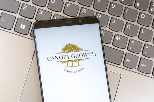 Toronto, Canada - February 14, 2021: Canopy Growth Logo On Smartphone Screen On Keyboard. Canopy Growth Corporation Is A Canadian Cannabis Company.