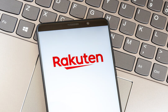 Toronto, Canada - February 14, 2021: Rakuten logo on smartphone screen on keyboard. Rakuten is a Japanese electronic commerce and online retailing company. 