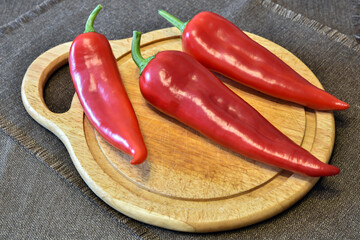 Red hot pepper on a cutting board
