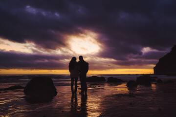 silhouette couple on the beach