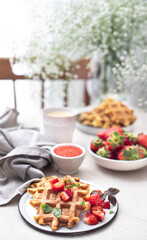 Homemade belgian waffles with berries