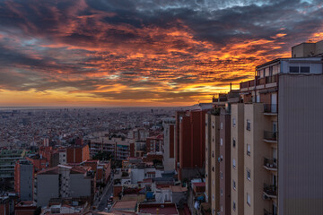 Sunset over the tall buildings of the city