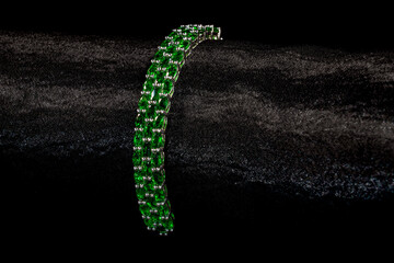 Isolated emerald bracelet on a black background
